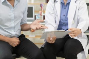 A young man was speaking with a doctor regarding a PSA test for prostate issues.