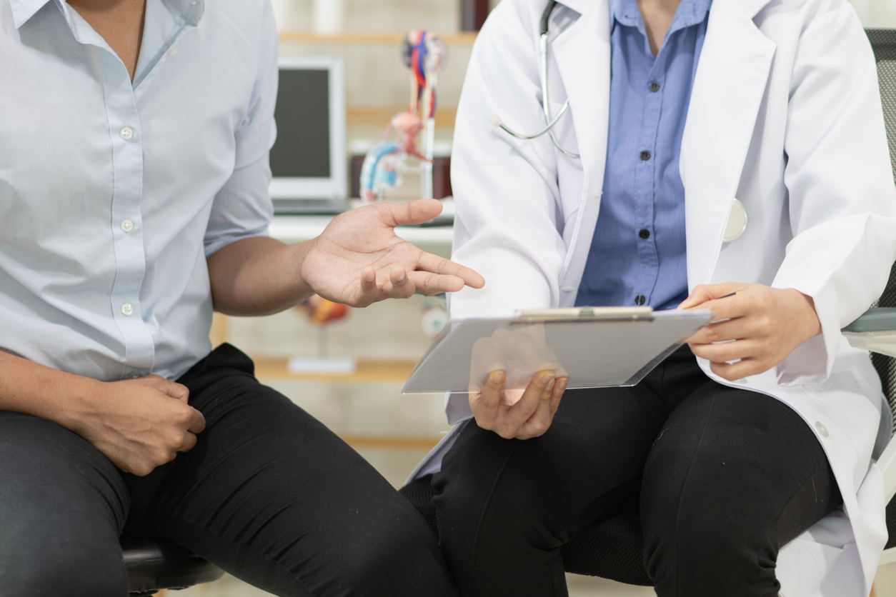 A young man was speaking with a doctor regarding a PSA test for prostate issues.